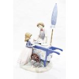 Lladro figure group of an icecream seller, the boy giving an icecream to a girl with puppy,