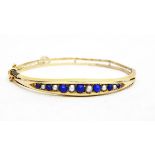 Gold, pearl and lapis lazuli bangle,