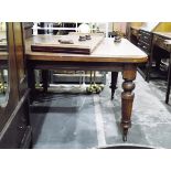 Victorian mahogany extending dining table with moulded edged top,