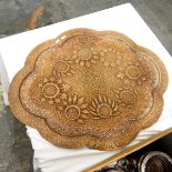 Indo-Persian copper lobed oval tray, pierced and embossed with bracelets,