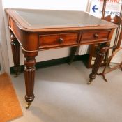 Victorian mahogany writing table, rectangular with quadrant mould edge,