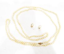 Single row of simulated pearls with a 9ct gold filigree clasp and a pair of pearl clip-on earrings,