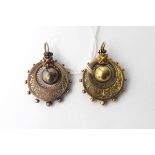 Pair of late Victorian gold-coloured pendant earrings of circular form with a central suspended