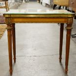 Pair of Louis XVI-style rectangular occasional tables with glass tops, on turned tapering legs,