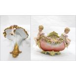 Noritake porcelain wall shelf, handpainted with floral garlands, moulded gilt scroll rim,