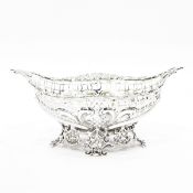 Victorian silver bonbon dish by William Comyns, London 1891, of shaped oval form with pierced sides,