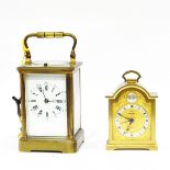 Carriage clock in brass case with enamel dial and a Swiza small mantel clock (2)