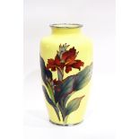 Japanese enamel vase, of tall, shouldered ovoid form, decorated with iris on a pale yellow ground,