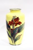 Japanese enamel vase, of tall, shouldered ovoid form, decorated with iris on a pale yellow ground,