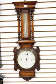 19th century oak-cased aneroid barometer with dentil cornice and temperature gauge flanked by