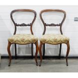 Set of eight Victorian balloon back rosewood dining chairs,