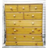 Modern pine chest of five short and three long drawers, on a plinth base,