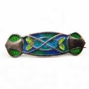 Edwardian Art Nouveau James Fenton silver and enamel brooch decorated with green and blue enamel