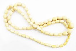 Turned graduated ivory bead necklace,