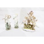 Collection of continental porcelain models of cherubs and putti,