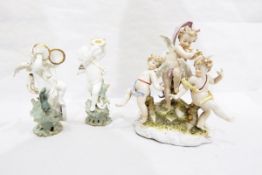 Collection of continental porcelain models of cherubs and putti,