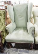 Victorian wing side easy chair on turned supports