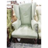 Victorian wing side easy chair on turned supports