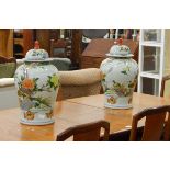 Pair of Chinese porcelain inverse-baluster vases and covers, each decorated with cranes,