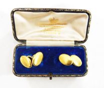 Pair of late 19th/early 20th century gold cufflinks of plain oval form,