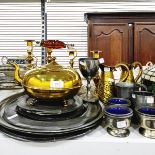Various pewter platters and smaller plates, metal salts lined with blue glass, a pair of brass jugs,
