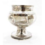 Silver drinking cup, probably by Nathan & Hayes, Chester, (marks rubbed), on circular pedestal foot,