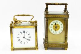 Carriage clock in ornate brass case, with bevelled glass panels,