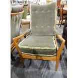 Pair of green dralon and shewwood open arm easy chairs