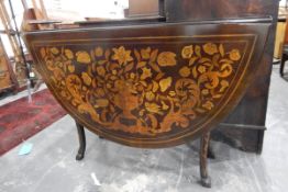 19th century mahogany and satinwood floral inlaid drop-leaf dining table with overall floral