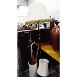 Brass standard lamp with shade, two brass table lamps,