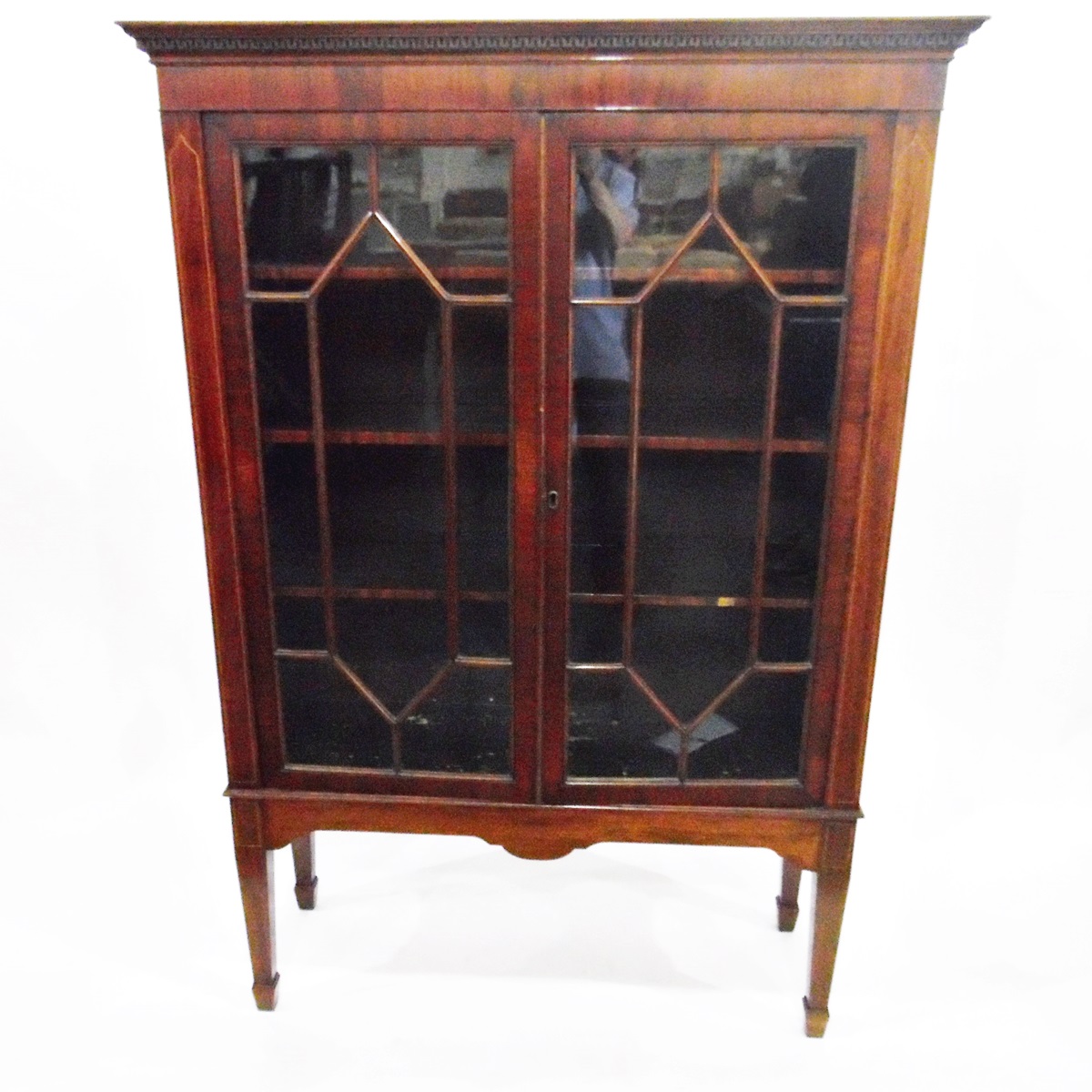 Edwardian mahogany glazed bookcase with Greek key pattern corners,