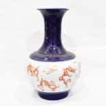 Porcelain vase of ball and shaft shape with flared rim,