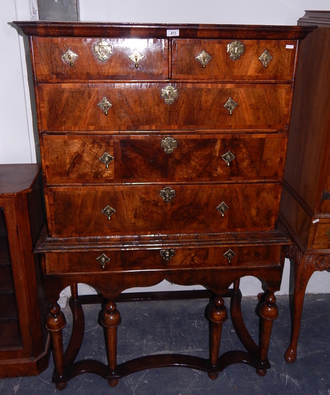 Early 18th century walnut chest on stand with moulded cornice,