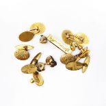 (Lot withdrawn) Pair of 15ct gold cufflinks, each double-oval with central bar, 18ct gold stud,
