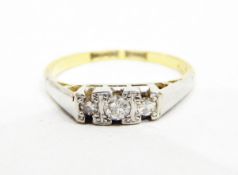 Gold three-stone diamond ring,