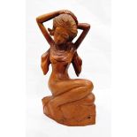 Malaysian/Balinese carved wood figure of partially draped female,