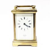 LOT WITHDRAWN Brass carriage clock, the dial with Roman numerals and inscribed St James, London,