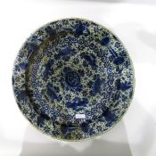 18th century Delft charger with underglaze blue decoration, in the Chinese manner, of peony,