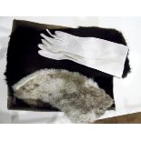 Three pairs of white kid gloves, various fur tippets and a cossack-style fur hat, etc.