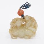 19th century Chinese carved jade model of a qilin with a boy on its back,