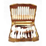 Canteen of silver plated flatware by Walker and Hall in fitted oak case