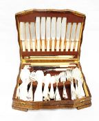 Canteen of silver plated flatware by Walker and Hall in fitted oak case