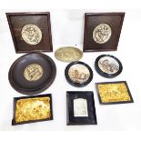 Quantity of oak-mounted silver-coloured relief moulded plaques, potlids, etc.