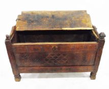 18th century continental chest with half-section hinged top, rosette carved panel front,