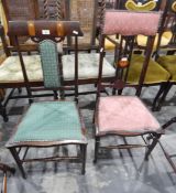 Two Edwardian standard chairs,