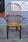 Elm and beech high spindle back Windsor chair on turned supports