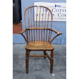 Elm and beech high spindle back Windsor chair on turned supports