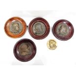 Set of four moulded brass plaques of profile portraits of gentleman, possibly Shakespeare,