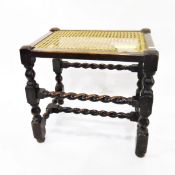 Oak rectangular top stool with cane panelled top on turned legs with spiral stretchers,