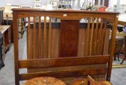 Edwardian mahogany double bedstead, the head and footboard with splats and strung decoration,